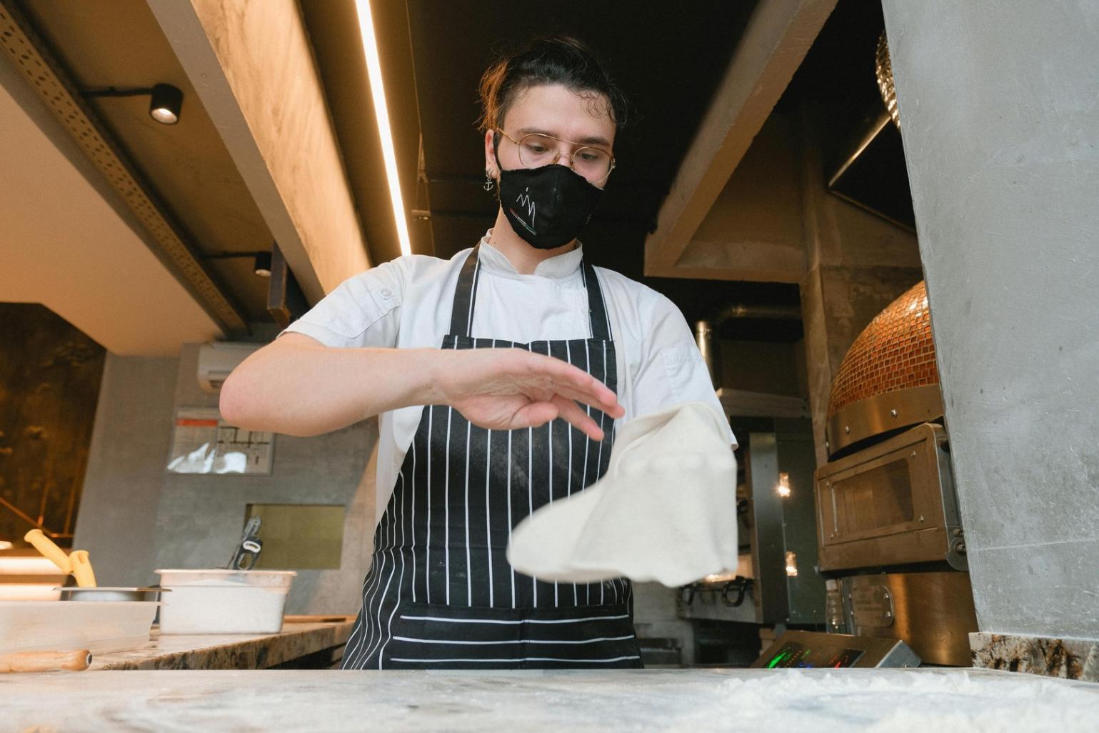 Close-up of cooking technique being practised during a Talvenox session